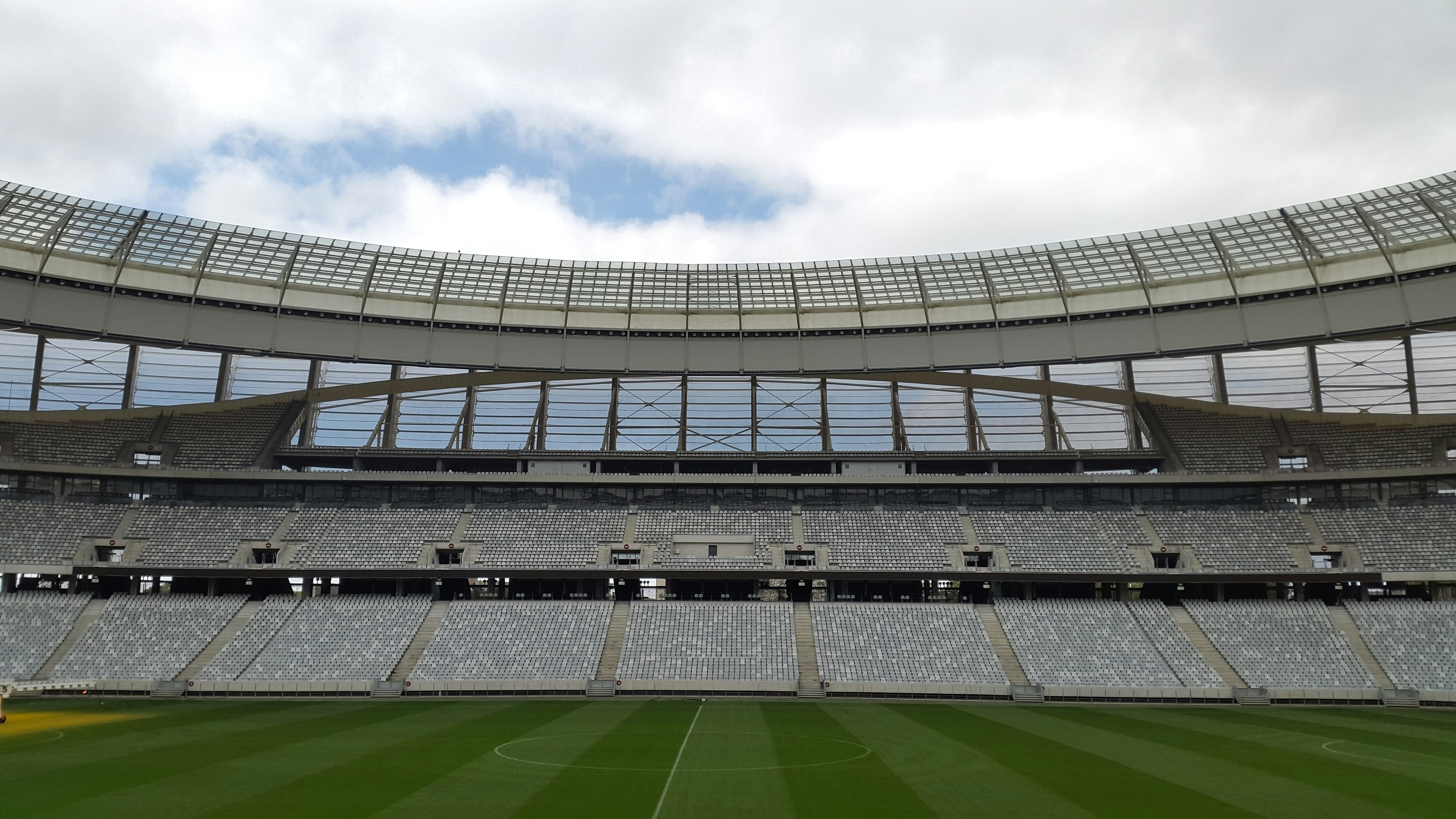 football stadium under cloudy sky